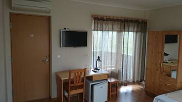 Фото номера Семейный номер (для 2 взрослых и 2 детей) Проживание в семье Aisa Accommodation г. Пярну 4