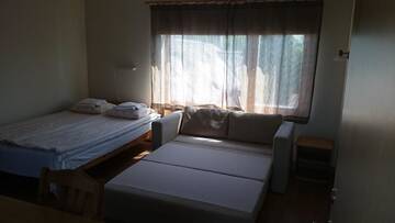 Фото номера Семейный номер (для 2 взрослых и 2 детей) Проживание в семье Aisa Accommodation г. Пярну 7