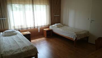 Фото номера Двухместный номер с 2 отдельными кроватями Проживание в семье Aisa Accommodation г. Пярну 5