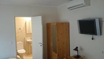 Фото номера Двухместный номер с 2 отдельными кроватями Проживание в семье Aisa Accommodation г. Пярну 6