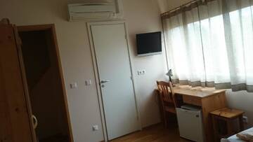 Фото номера Двухместный номер с 2 отдельными кроватями Проживание в семье Aisa Accommodation г. Пярну 12