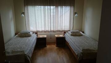 Фото номера Двухместный номер с 2 отдельными кроватями Проживание в семье Aisa Accommodation г. Пярну 19