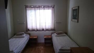 Фото номера Двухместный номер с 2 отдельными кроватями Проживание в семье Aisa Accommodation г. Пярну 16