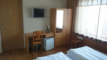 Фото номера Двухместный номер с 2 отдельными кроватями Проживание в семье Aisa Accommodation г. Пярну 17