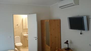Фото номера Двухместный номер с 2 отдельными кроватями Проживание в семье Aisa Accommodation г. Пярну 14