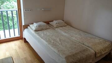 Фото номера Двухместный номер с 2 отдельными кроватями Проживание в семье Aisa Accommodation г. Пярну 20