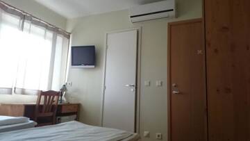 Фото номера Двухместный номер с 2 отдельными кроватями Проживание в семье Aisa Accommodation г. Пярну 18