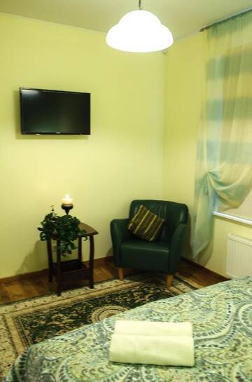 Фото номера Семейный номер с диваном Апарт-отели Embrace Guestrooms &amp; Apartments г. Пярну 8