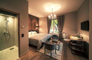 Фото номера Улучшенный двухместный номер с 1 кроватью Отель Frost Boutique Hotel г. Пярну 9