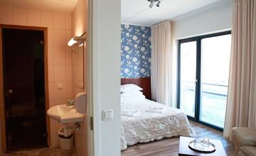 Фото номера Двухместный номер Делюкс с 1 кроватью Отель Hotell Tammsaare г. Пярну 6