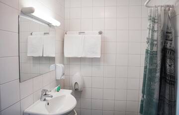 Фото номера Двухместный номер с 2 отдельными кроватями Отель Hotell Tammsaare г. Пярну 2