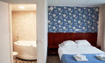 Фото номера Двухместный номер Делюкс с 1 кроватью Отель Hotell Tammsaare г. Пярну 2