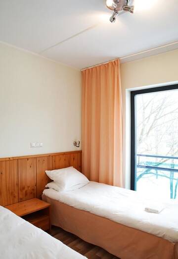 Фото номера Двухместный номер с 2 отдельными кроватями Отель Hotell Tammsaare г. Пярну 4