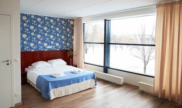 Фото номера Двухместный номер Делюкс с 1 кроватью Отель Hotell Tammsaare г. Пярну 5