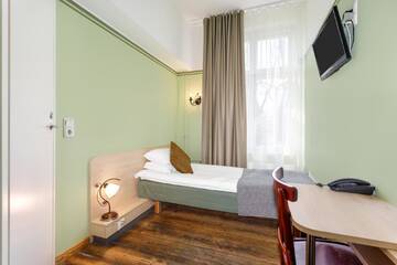 Фото номера Стандартный одноместный номер Отель Koidulapark Hotell г. Пярну 2