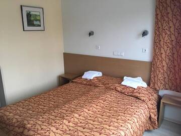 Фото номера Двухместный номер с 1 кроватью или 2 отдельными кроватями Отель Carolina Hotel г. Пярну 11