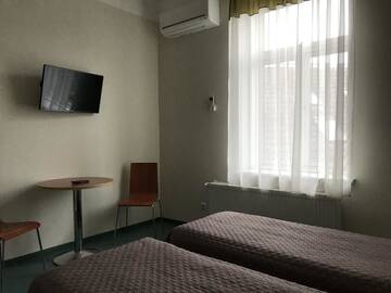 Фото номера Трехместный номер с мини-кухней Гостевой дом Hommiku Guesthouse г. Пярну 7