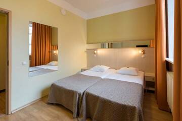 Фото номера Семейный номер с видом на сад Отель Viiking Spa Hotel г. Пярну 7