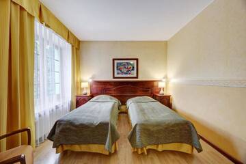 Фото номера Двухместный номер с 2 отдельными кроватями Отель Hotel Legend г. Пярну 6