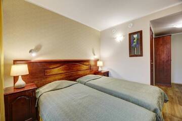 Фото номера Двухместный номер с 2 отдельными кроватями Отель Hotel Legend г. Пярну 3