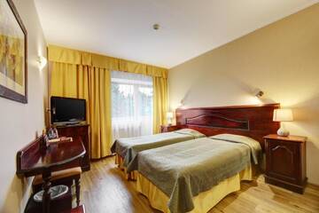 Фото номера Двухместный номер с 2 отдельными кроватями Отель Hotel Legend г. Пярну 4