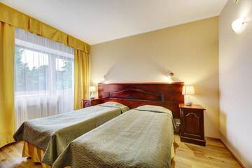 Фото номера Двухместный номер с 2 отдельными кроватями Отель Hotel Legend г. Пярну 5