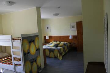 Фото номера Семейный номер (для 2 взрослых и 2 детей) Гостевой дом Tulbi Guesthouse г. Пярну 3