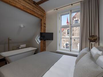 Фото номера Люкс с сауной и ванной Отель Boutique Hotel Rosenplänter г. Пярну 4