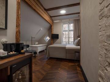 Фото номера Люкс с сауной и ванной Отель Boutique Hotel Rosenplänter г. Пярну 7