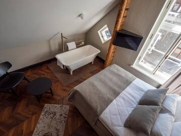 Фото номера Люкс с сауной и ванной Отель Boutique Hotel Rosenplänter г. Пярну 3